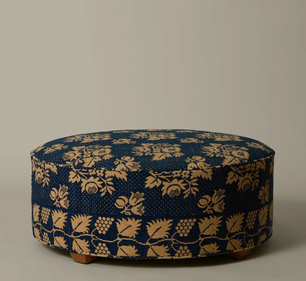 Pierce & Ward CIRCLE OTTOMAN IN ANTIQUE AMERICAN COVERLET | Furniture | Pierce & Ward Collection