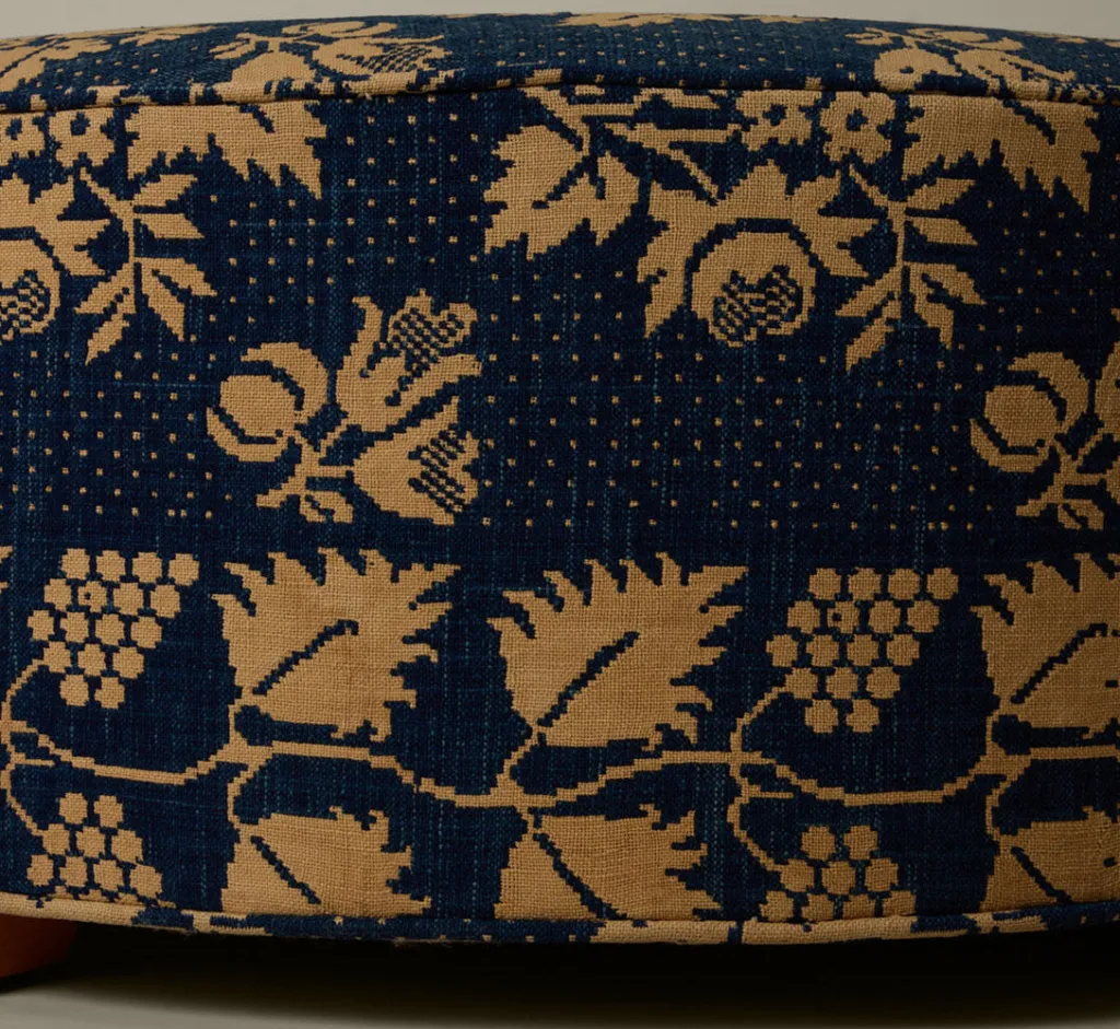 Pierce & Ward CIRCLE OTTOMAN IN ANTIQUE AMERICAN COVERLET | Furniture | Pierce & Ward Collection